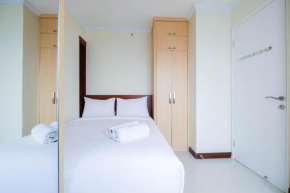 Cozy 2BR Bassura City Apartment By Travelio